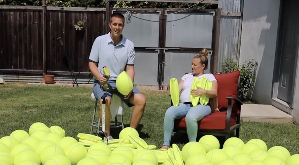 Man fills yard with 100 giant balls to celebrate his Boxer''s cancer-free victory