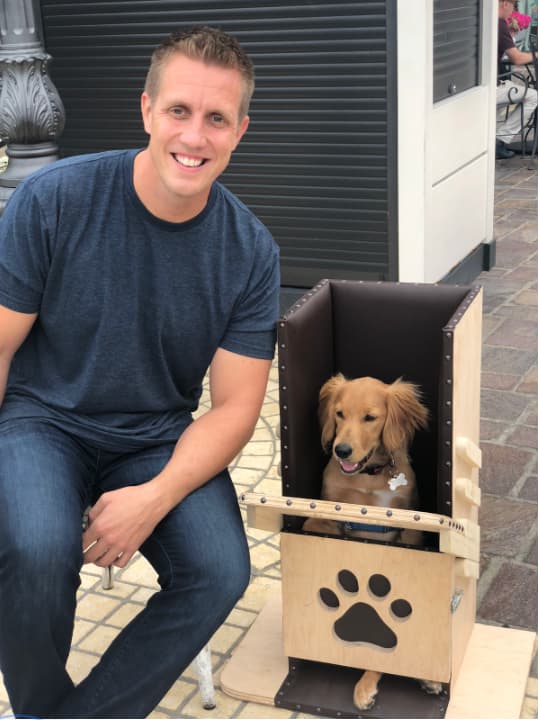 Rocky Kanaka and his foster dog Jalapeño.