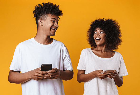 2 people laughung at funny video