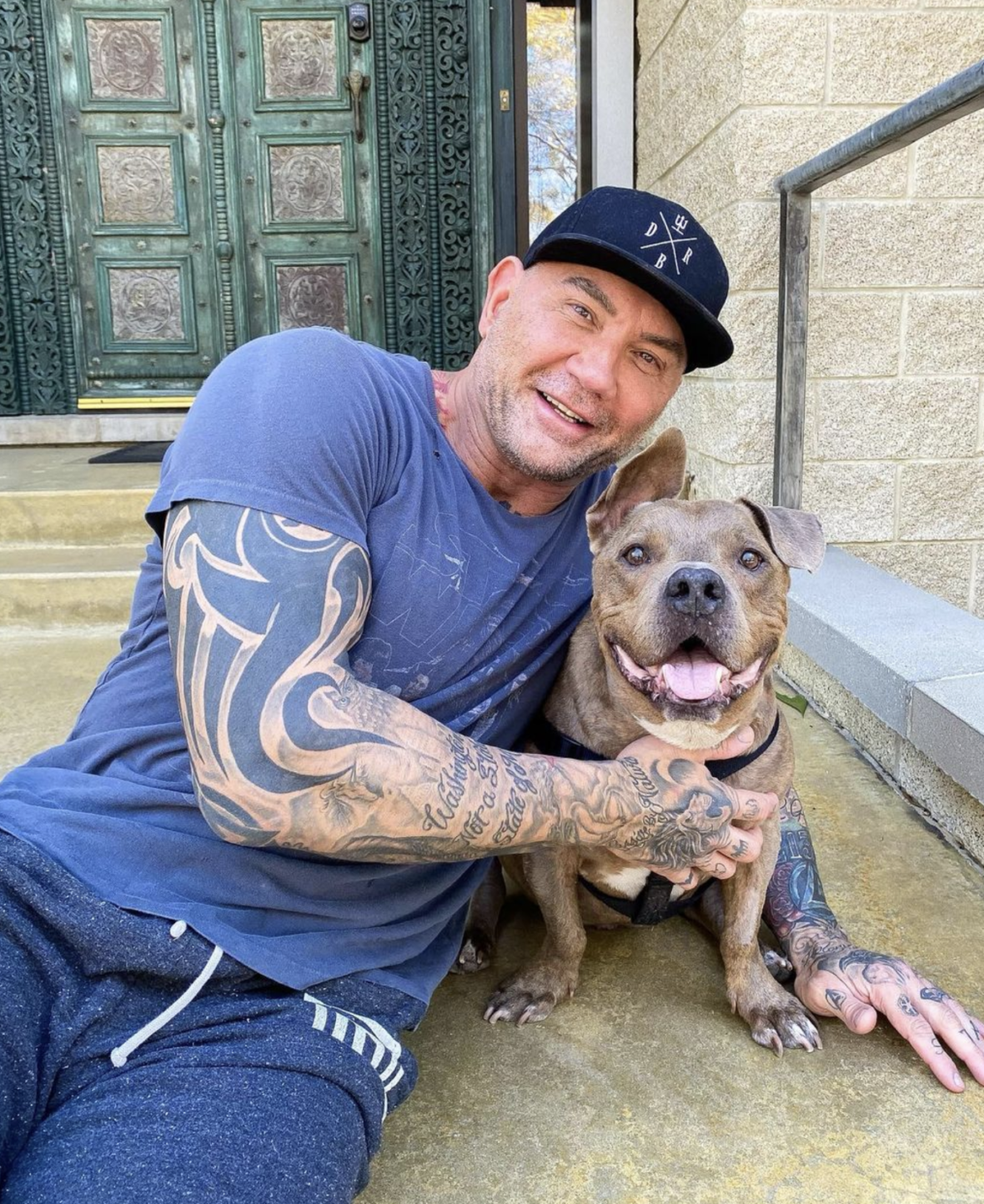 Celebrities Own Pitbulls - David bautista and his dog